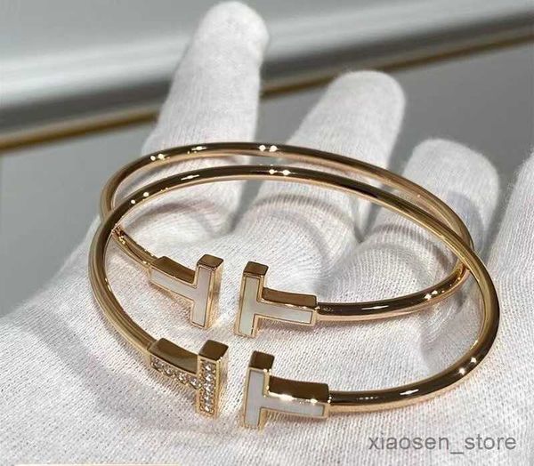 bangle designer 18k gold bracelet double shaped diamond highly polished fashion white shell open bracelet coil ladies bracelet. r230808, Black
bangle designer 18k gold bracelet double shaped diamond highly polished fashion white shell open bracelet coil ladies bracelet. r230808, Black