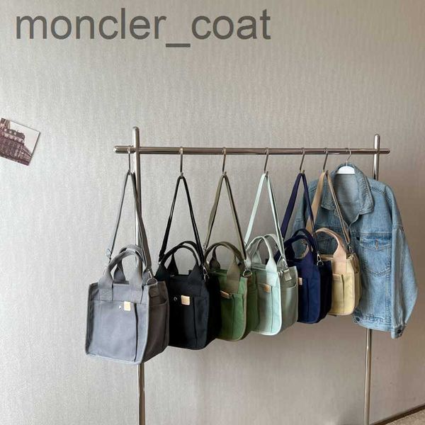 handheld small square bag for women's bag 2023 new spring/summer minimalist canvas bag for commuting women's bag sense of fashion
handheld small square bag for women's bag 2023 new spring/summer minimalist canvas bag for commuting women's bag sense of fashion