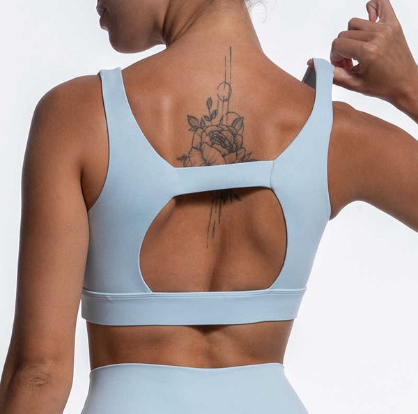 tight solid color hollowed out design sports bra high waisted nude fitness pants yoga set
tight solid color hollowed out design sports bra high waisted nude fitness pants yoga set