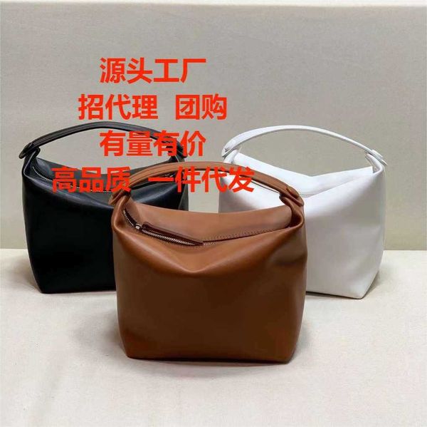 the row lunch box bag niche design 2023 new high-end texture bucket bag women's leather carrying bag
the row lunch box bag niche design 2023 new high-end texture bucket bag women's leather carrying bag