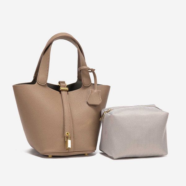 a designer tote bag her mas handbag h picotn designer bags bag girl new style vegetable basket handheld fashion simple versatile one shoulde
a designer tote bag her mas handbag h picotn designer bags bag girl new style vegetable basket handheld fashion simple versatile one shoulde