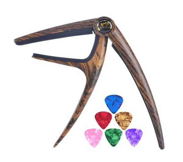 sapele wood grain zinc alloy spring capo with 6pcs guitar picks trigger style capos5820209
sapele wood grain zinc alloy spring capo with 6pcs guitar picks trigger style capos5820209