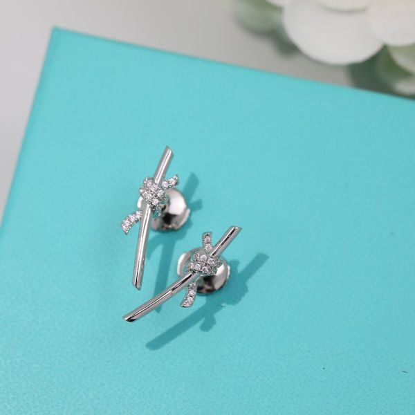 new s925 sterling silver knot ear studs for women's korean edition light luxury, high end, small and personalized ear accessories, Golden
new s925 sterling silver knot ear studs for women's korean edition light luxury, high end, small and personalized ear accessories, Golden