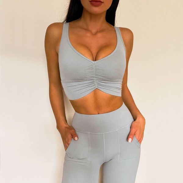 tight pleated shockproof bra with sleeveless and buttocks up double side pockets yoga pants women's fitness suit
tight pleated shockproof bra with sleeveless and buttocks up double side pockets yoga pants women's fitness suit