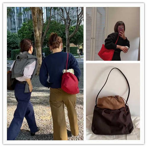 the row nylon cloud bag from south korea premium and small pack large capacity commuting tote bag single shoulder and underarm
the row nylon cloud bag from south korea premium and small pack large capacity commuting tote bag single shoulder and underarm