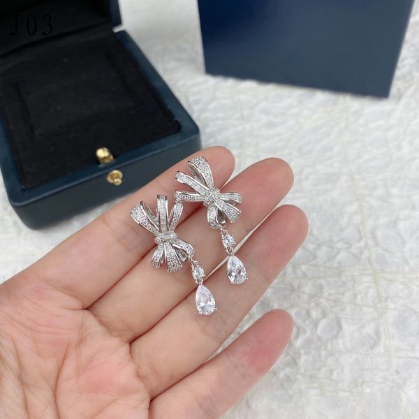 premium full diamond stereoscopic bow earrings 925 silver fashion drop pendant long earrings designer elegant jewelry earrings
premium full diamond stereoscopic bow earrings 925 silver fashion drop pendant long earrings designer elegant jewelry earrings