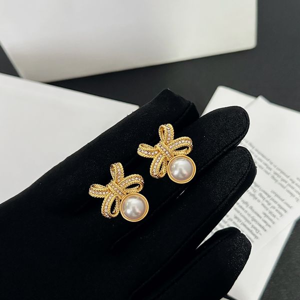 luxury brand designer jewelry bowknot stud earrings pearl studs for women gold plated bowknot earrings, Golden
luxury brand designer jewelry bowknot stud earrings pearl studs for women gold plated bowknot earrings, Golden