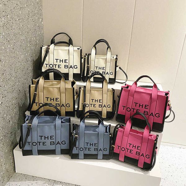 new women's bag solid color spliced pu letter tote simple casual crossbody large capacity handbag
new women's bag solid color spliced pu letter tote simple casual crossbody large capacity handbag