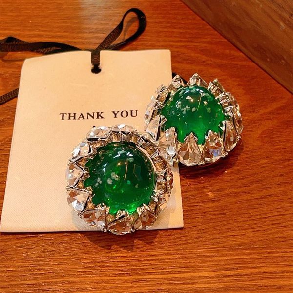 light luxury style, heavy industry, green large zircon earrings, elegant style, exaggerated geometric circle, personalized trendy and flowin, Golden
light luxury style, heavy industry, green large zircon earrings, elegant style, exaggerated geometric circle, personalized trendy and flowin, Golden