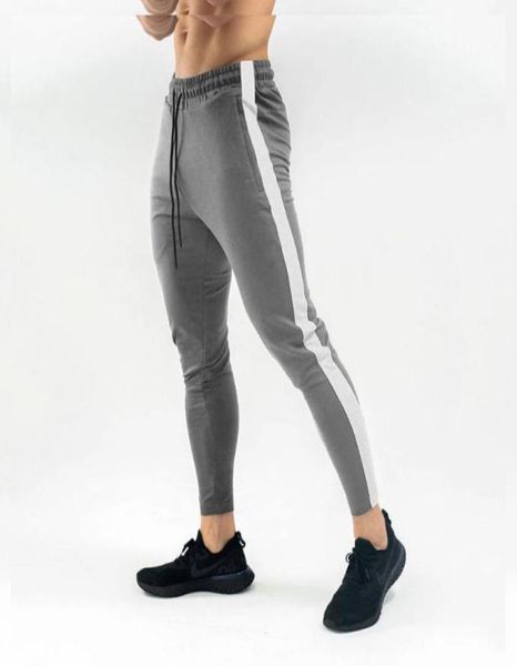 ss autumn new men fitness sweatpants male gyms bodybuilding workout cotton trousers casual joggers sportswear pencil pants2605208, Black
ss autumn new men fitness sweatpants male gyms bodybuilding workout cotton trousers casual joggers sportswear pencil pants2605208, Black