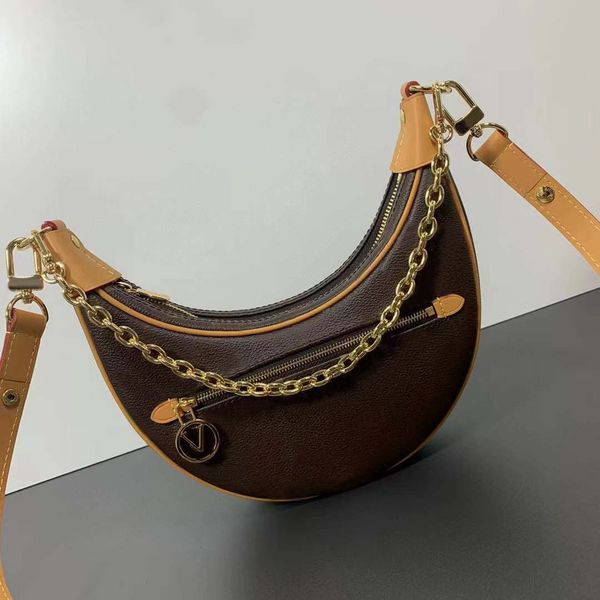 latest single moon bag crescent bag zipper bag with chain decoration 23cm real leather.
latest single moon bag crescent bag zipper bag with chain decoration 23cm real leather.