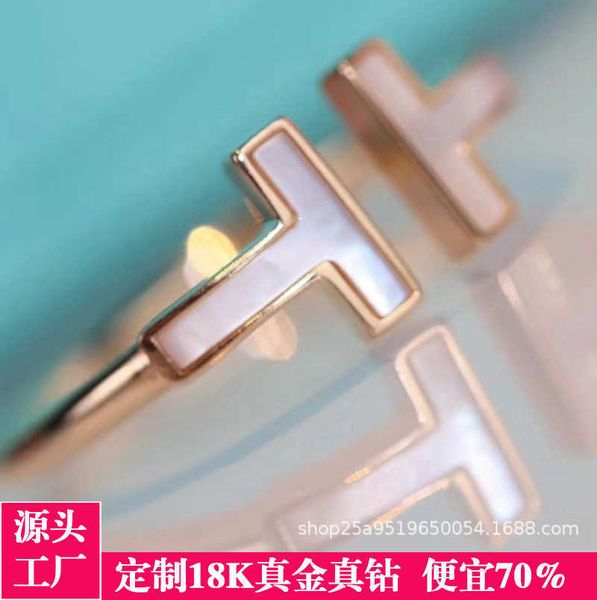 v gold bag 18 k double t split ring letter white shell set diamond new, Silver
v gold bag 18 k double t split ring letter white shell set diamond new, Silver
