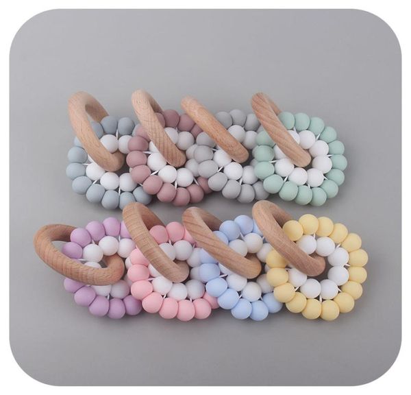 natural wooden ring teethers for baby health care accessories infant fingers exercise toys colorful silicone beaded soothers z41394149881
natural wooden ring teethers for baby health care accessories infant fingers exercise toys colorful silicone beaded soothers z41394149881