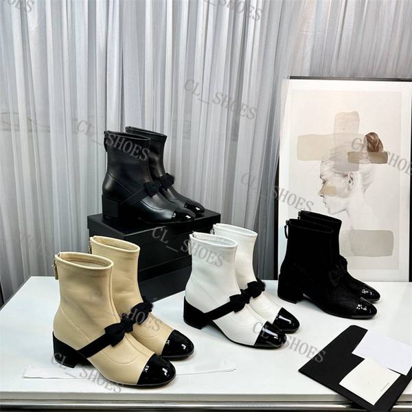 2023 designer women ankle boots lambskin stretch boot bow decorative chunky high heels bright leather short boots ladie outdoor boot, Black
2023 designer women ankle boots lambskin stretch boot bow decorative chunky high heels bright leather short boots ladie outdoor boot, Black