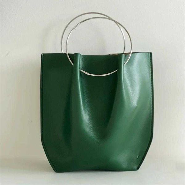 thero cowhide designer bags women tote metal round handbag handheld wrist bag for women 230815
thero cowhide designer bags women tote metal round handbag handheld wrist bag for women 230815