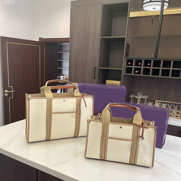 large capacity shoulder bag luggage shopping bags canvas splicing strap leather bottom remove pendant hardware rivet fashion tote high quali
large capacity shoulder bag luggage shopping bags canvas splicing strap leather bottom remove pendant hardware rivet fashion tote high quali
