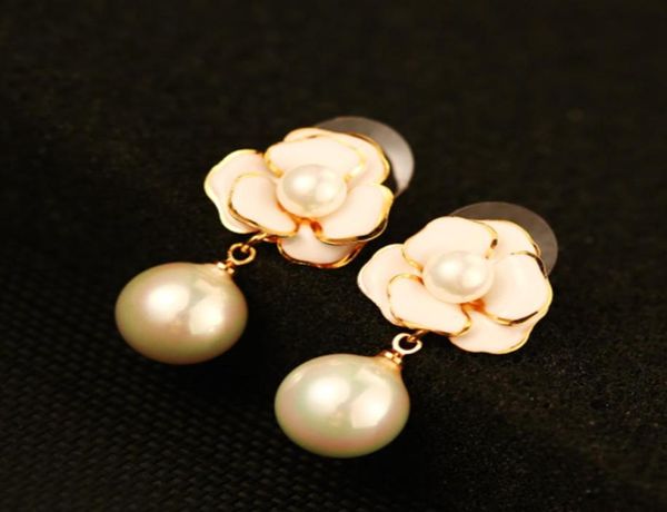 new trendy classic fashion designer camellia flower elegent pearl pendant drop stud dangle chandelier earrings for woman girls8109052, Golden;silver
new trendy classic fashion designer camellia flower elegent pearl pendant drop stud dangle chandelier earrings for woman girls8109052, Golden;silver