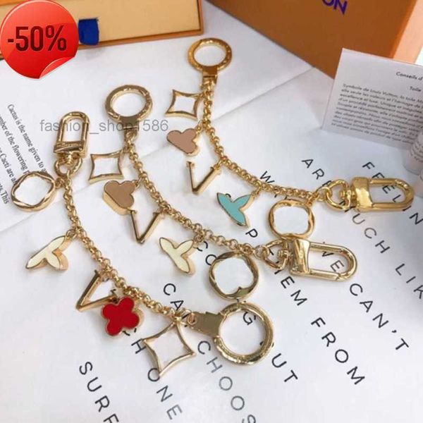 keychains lanyards luxury designer keychain fashion classic brand key buckle flower letter chain handmade gold mens womens bag pendant 662es, Silver
keychains lanyards luxury designer keychain fashion classic brand key buckle flower letter chain handmade gold mens womens bag pendant 662es, Silver