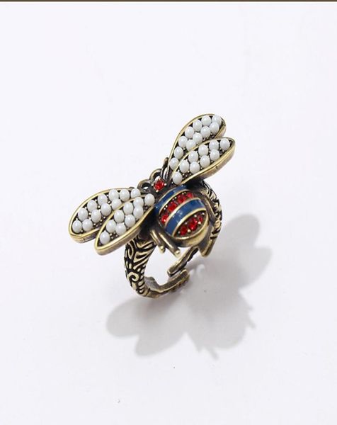fashion jewelry copper retro pearl doublewinged bee red and blue diamond ringring for woman7316820, Silver
fashion jewelry copper retro pearl doublewinged bee red and blue diamond ringring for woman7316820, Silver