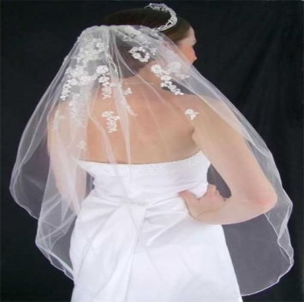 chantilly lace accented with silver embroidery and adorned with rice pearl wedding veil 0015168024
chantilly lace accented with silver embroidery and adorned with rice pearl wedding veil 0015168024