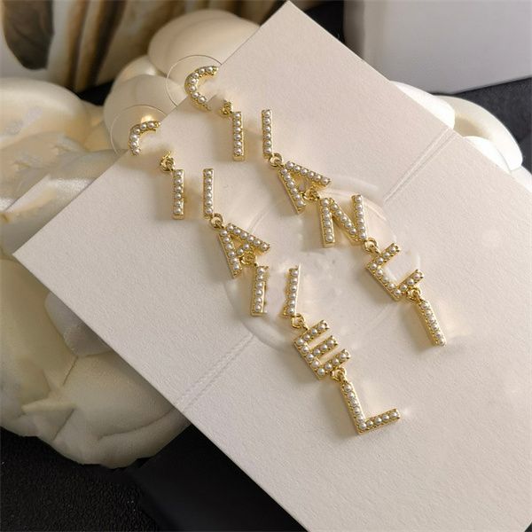 woman stud c logo earrings designer letter c long chain earring women jewelry ccity double pearl crystal orecchini 7432, Golden;silver
woman stud c logo earrings designer letter c long chain earring women jewelry ccity double pearl crystal orecchini 7432, Golden;silver