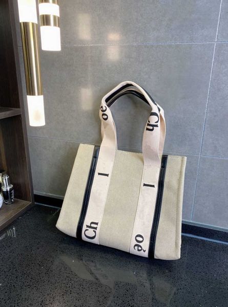 women handbags woody tote shopping bag luxury designer handbag classic canvas fashion raffia beach bags travel crossbody summer shoulder wal
women handbags woody tote shopping bag luxury designer handbag classic canvas fashion raffia beach bags travel crossbody summer shoulder wal