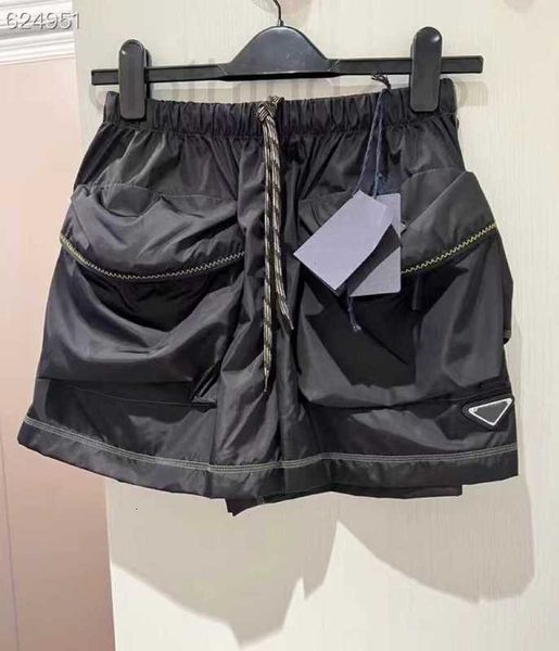 women's shorts designer 2023 summer new handsome big pocket triangle decorative workwear style elastic high waist drawstring for women, White;black 
women's shorts designer 2023 summer new handsome big pocket triangle decorative workwear style elastic high waist drawstring for women, White;black