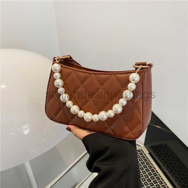pearl handheld small bag for summer new fashion one underarm simplified crossbody lingge square bagstylishdesignerbags
pearl handheld small bag for summer new fashion one underarm simplified crossbody lingge square bagstylishdesignerbags