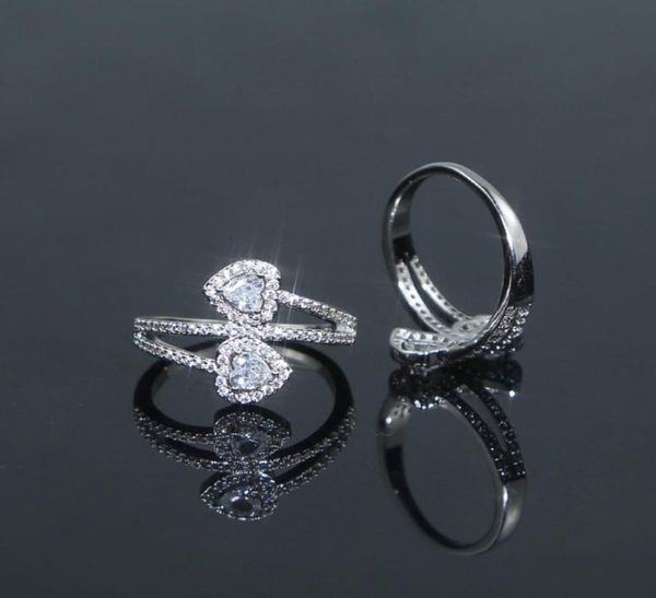 iced out bling cz paved heart ring girlfriend lover fashion cute double heart shape bride wedding party finger rings jewelry whole9480774, Slivery;golden
iced out bling cz paved heart ring girlfriend lover fashion cute double heart shape bride wedding party finger rings jewelry whole9480774, Slivery;golden