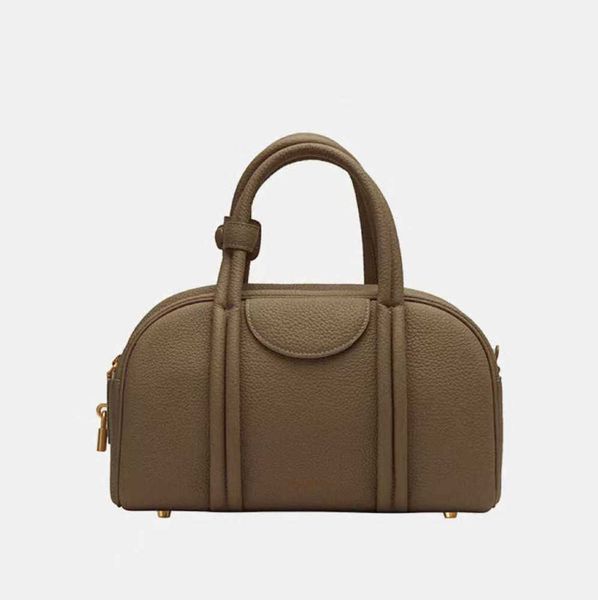 songmont medium and small bowling series boston bag cowhide new designer one shoulder handbag women's bag2023
songmont medium and small bowling series boston bag cowhide new designer one shoulder handbag women's bag2023