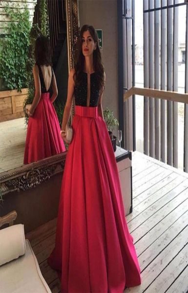 open back fuchsia long evening prom dresses arabic formal dress black beaded vestido de gala custom special occasion evening gowns6650787, Black;red
open back fuchsia long evening prom dresses arabic formal dress black beaded vestido de gala custom special occasion evening gowns6650787, Black;red