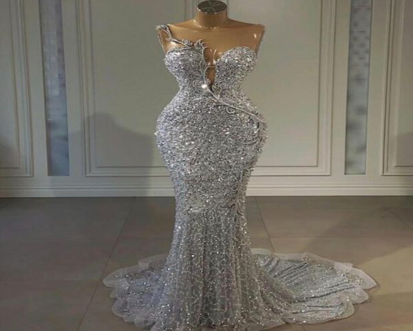2021 plus size arabic aso ebi silver mermaid prom dresses lace sheer neck beaded evening formal party second reception gowns 5895124, Black
2021 plus size arabic aso ebi silver mermaid prom dresses lace sheer neck beaded evening formal party second reception gowns 5895124, Black