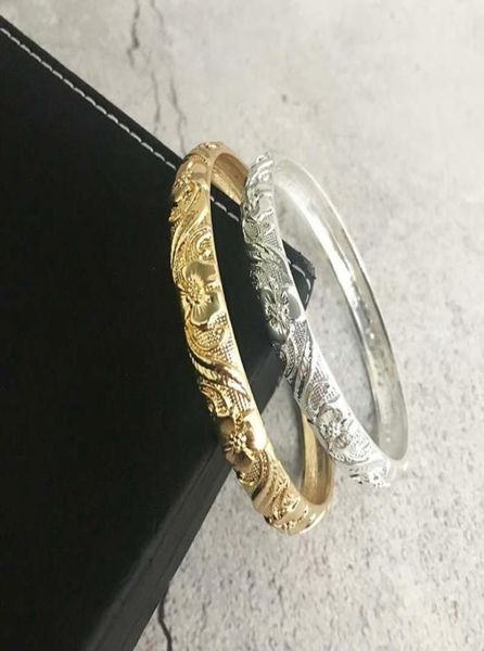 bangle dubai jewelry woman metal gold bracelet with designer charms brand for women carving flowers girlfriends5197015, Black
bangle dubai jewelry woman metal gold bracelet with designer charms brand for women carving flowers girlfriends5197015, Black
