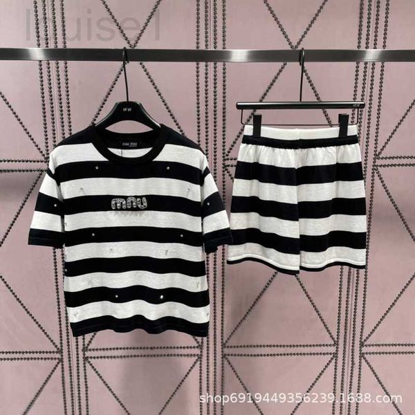 women's two piece pants designer 23 pre autumn new casual pullover knitted set with black and white stripes chest heavy work accessorie
women's two piece pants designer 23 pre autumn new casual pullover knitted set with black and white stripes chest heavy work accessorie