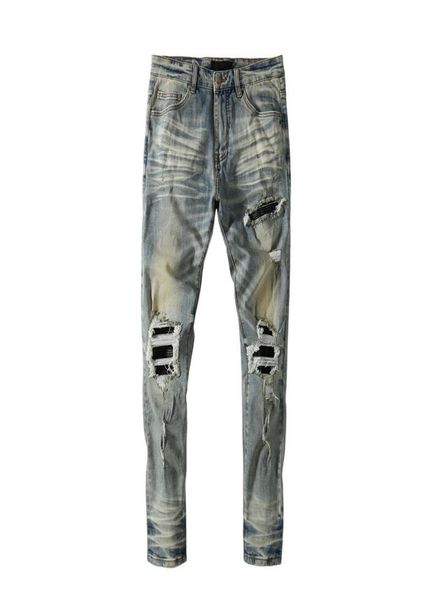 mens jeans with holes patchwork leather dark blue washing water used trousers europe and america1651029
mens jeans with holes patchwork leather dark blue washing water used trousers europe and america1651029