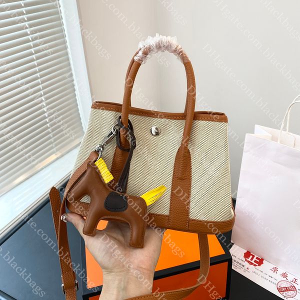 classic women tote bag designer garden bag mini canvas shopping bags for womens large capacity handbag casual versatile
classic women tote bag designer garden bag mini canvas shopping bags for womens large capacity handbag casual versatile