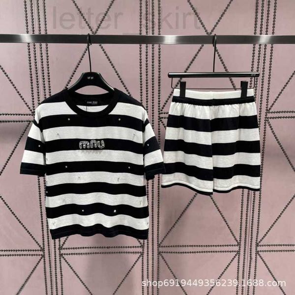 women's two piece pants designer 23 pre autumn new casual pullover knitted set with black and white stripes chest heavy work accessorie
women's two piece pants designer 23 pre autumn new casual pullover knitted set with black and white stripes chest heavy work accessorie