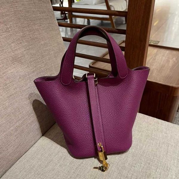 high definition layer cowhide sea anemone purple bucket bag new leather vegetable basket children's commuting handbag
high definition layer cowhide sea anemone purple bucket bag new leather vegetable basket children's commuting handbag