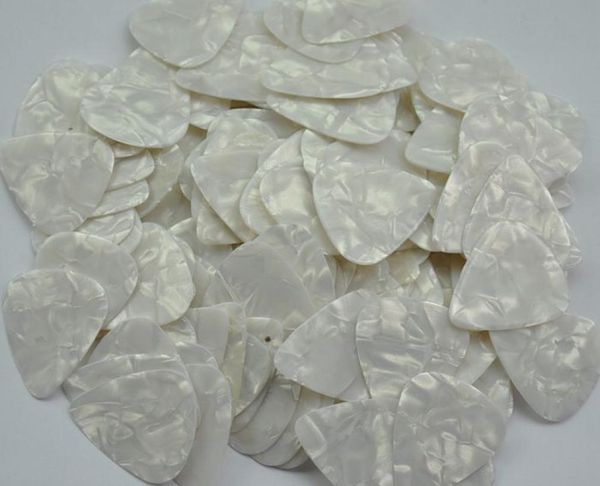 lots of 100 pcs medium 071mm guitar picks plectrums celluloid pearl white7479076
lots of 100 pcs medium 071mm guitar picks plectrums celluloid pearl white7479076