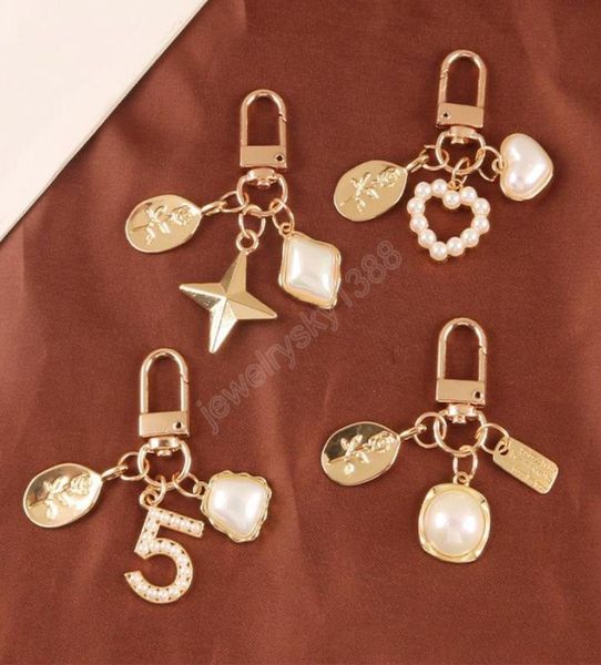 creative vintage rose pattern key chain for women girl cute pearl heart key ring holder trinket bag charms jewelry5958300, Slivery;golden 
creative vintage rose pattern key chain for women girl cute pearl heart key ring holder trinket bag charms jewelry5958300, Slivery;golden