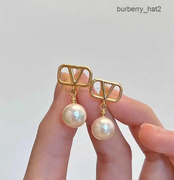 women fashion designer stud earrings white pearl simple style brass engagement earring, Golden
women fashion designer stud earrings white pearl simple style brass engagement earring, Golden