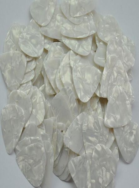lots of 100 pcs medium 071mm guitar picks plectrums celluloid pearl white7550685
lots of 100 pcs medium 071mm guitar picks plectrums celluloid pearl white7550685