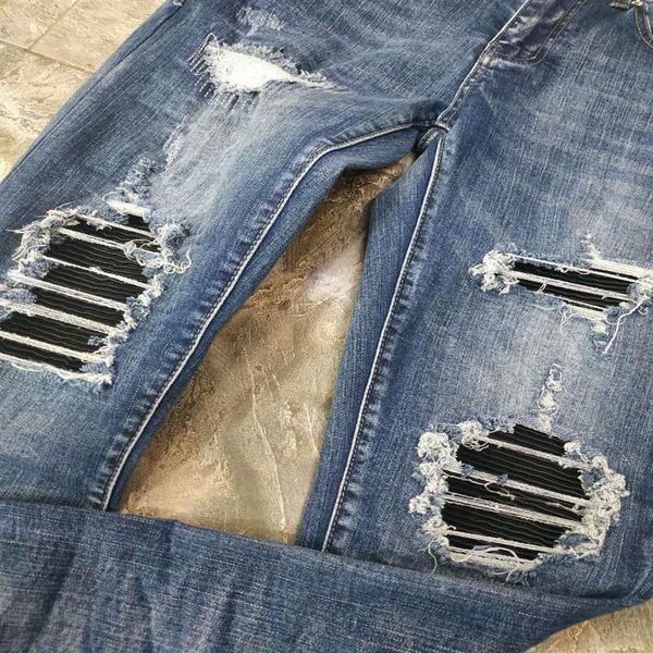 new design winter mens jeans blue designer leather patch spliced ripped high street destroyed denim jeans us size w28227e
new design winter mens jeans blue designer leather patch spliced ripped high street destroyed denim jeans us size w28227e