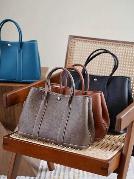 designer herbags mas s tote bags garden party bag new fashion leather garden bag women's large capacity bucket one shoulder portable br
designer herbags mas s tote bags garden party bag new fashion leather garden bag women's large capacity bucket one shoulder portable br