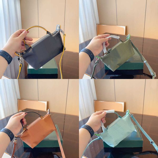 designer dumpling purse women cute crossbody bags mini shoulder bags handle handbag makeup bag mobile phone bag 230715
designer dumpling purse women cute crossbody bags mini shoulder bags handle handbag makeup bag mobile phone bag 230715