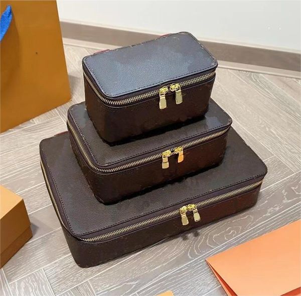 designers women toiletry travel pouch ladies makeup bag printed letters modern travel jewelry box cosmetic bag storage box
designers women toiletry travel pouch ladies makeup bag printed letters modern travel jewelry box cosmetic bag storage box