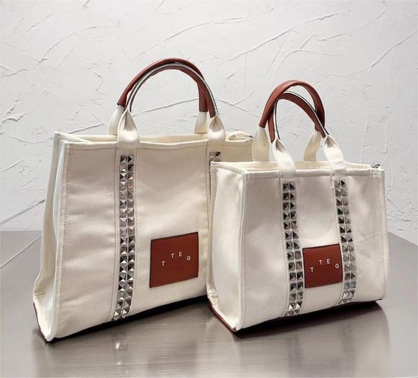 designer traveler tote bags crossbody shopping bag handbags lady luxury famous brands canvas rivet shoulder bag for women
designer traveler tote bags crossbody shopping bag handbags lady luxury famous brands canvas rivet shoulder bag for women