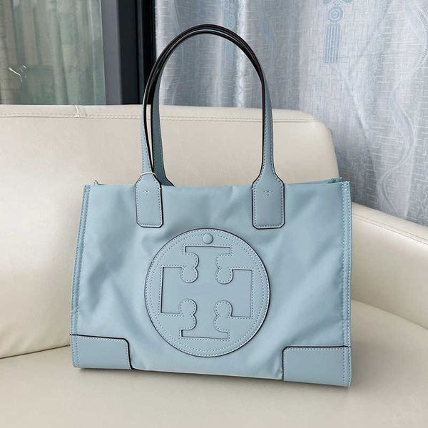 designer bag 2024 early launch tb classic ella tote single shoulder waterproof nylon spliced cowhide handbag high capacity computer
designer bag 2024 early launch tb classic ella tote single shoulder waterproof nylon spliced cowhide handbag high capacity computer