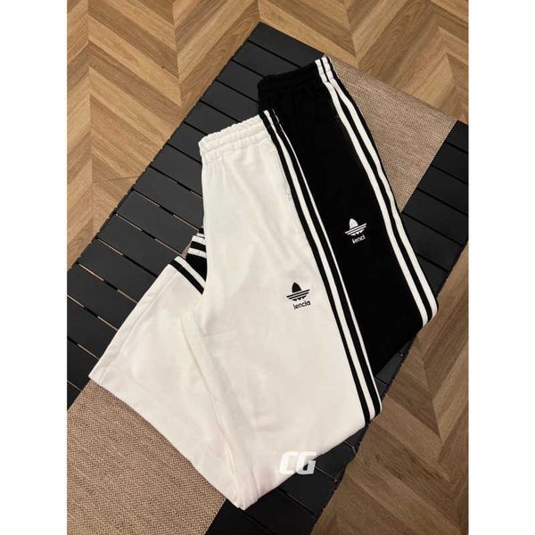 high version clothing men women sports pants classic embroidered sweatpants balen designer pants loose casual wide-leg trousers, Black
high version clothing men women sports pants classic embroidered sweatpants balen designer pants loose casual wide-leg trousers, Black