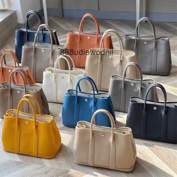 authentic handbag designer garden party tote bag high order wax thread leather women's bag togo leather bag tote bag portable large cap
authentic handbag designer garden party tote bag high order wax thread leather women's bag togo leather bag tote bag portable large cap